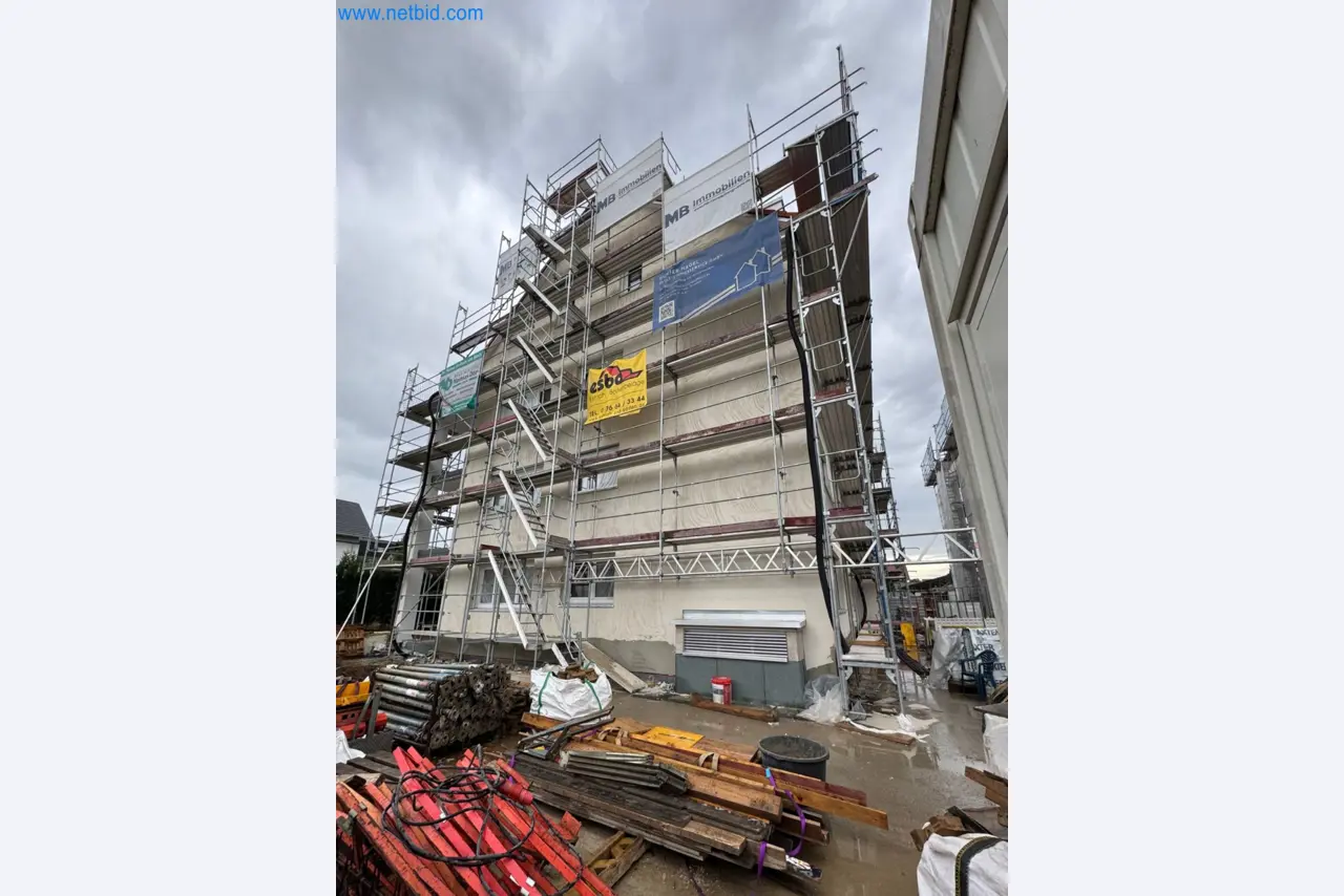 Scaffolding components (some from the construction site), machinery, and vehicles belonging to a construction company-6