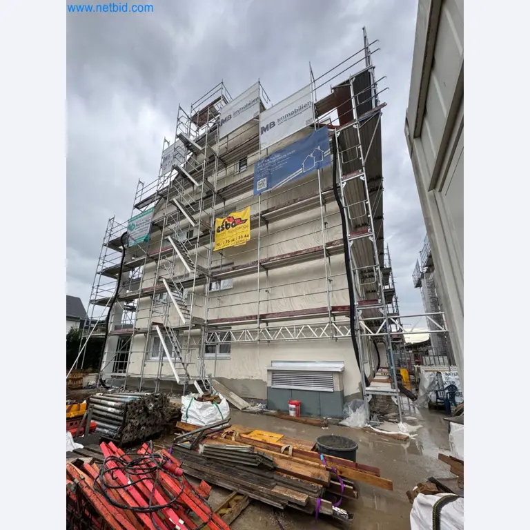 Scaffolding components (some from the construction site), machinery, and vehicles belonging to a construction company-6