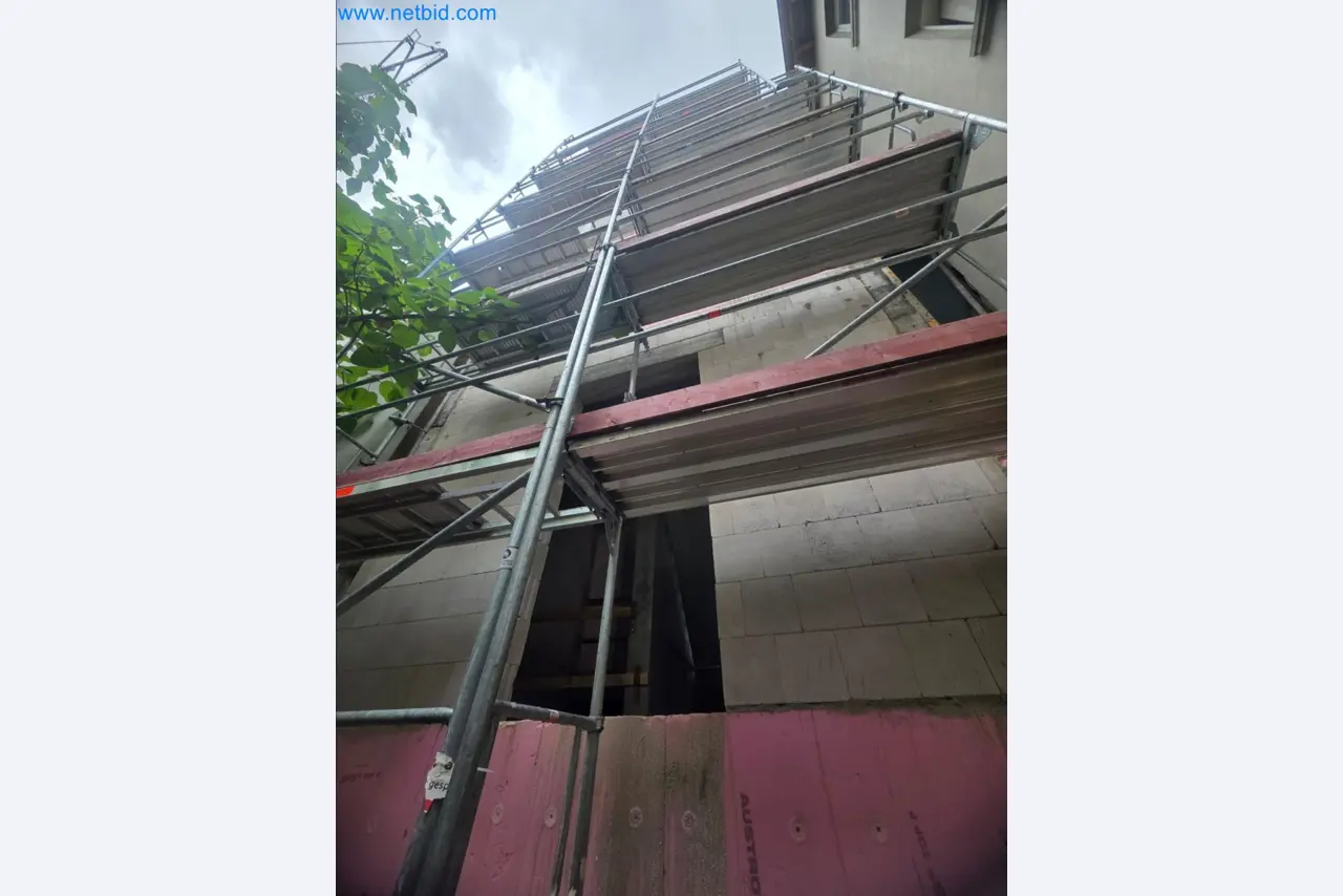 Scaffolding components (some from the construction site), machinery, and vehicles belonging to a construction company-1