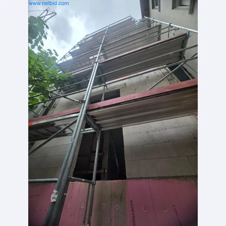 Scaffolding components (some from the construction site), machinery, and vehicles belonging to a construction company-1