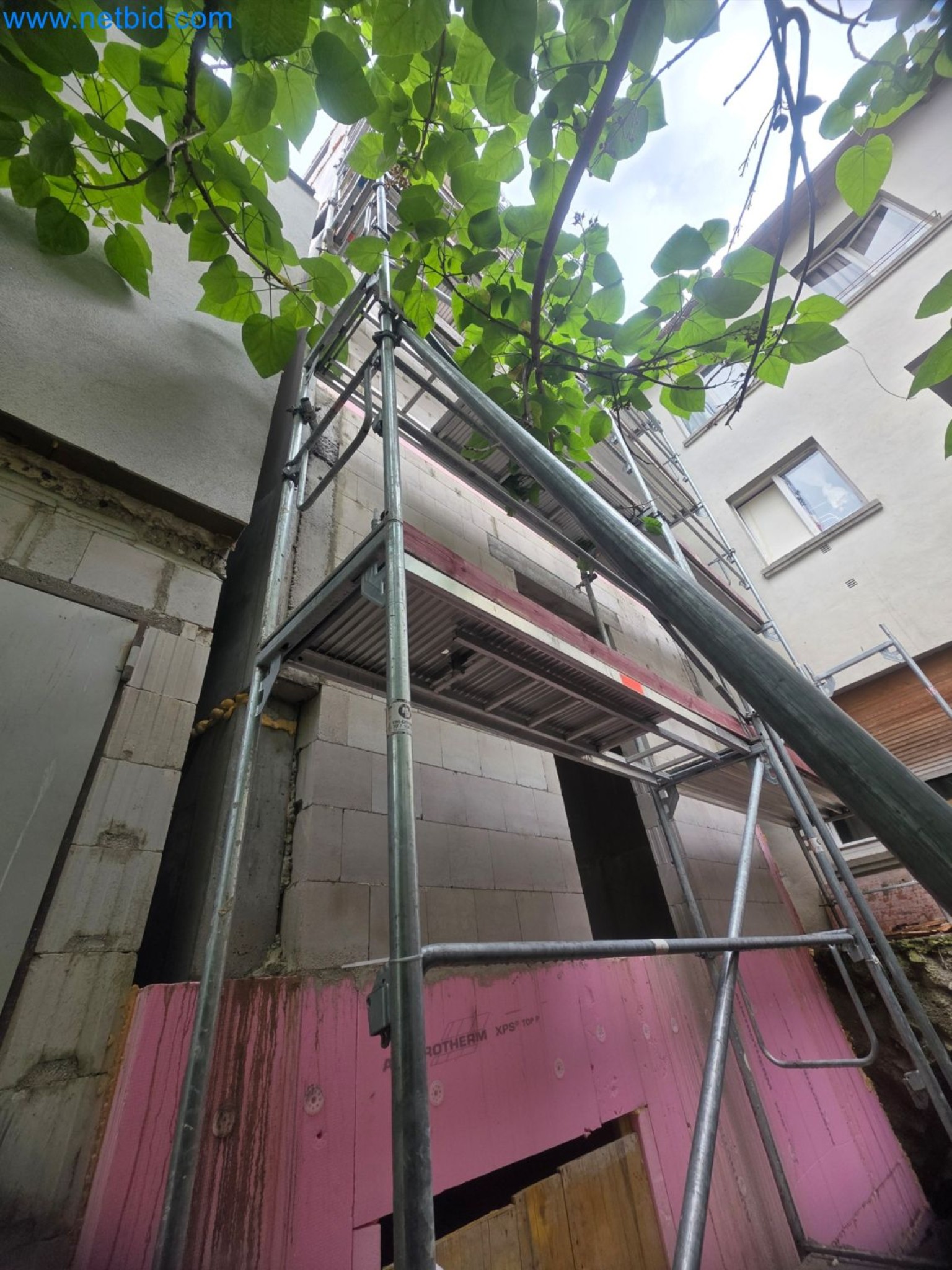 Scaffolding components (some from the construction site), machinery, and vehicles belonging to a construction company-2