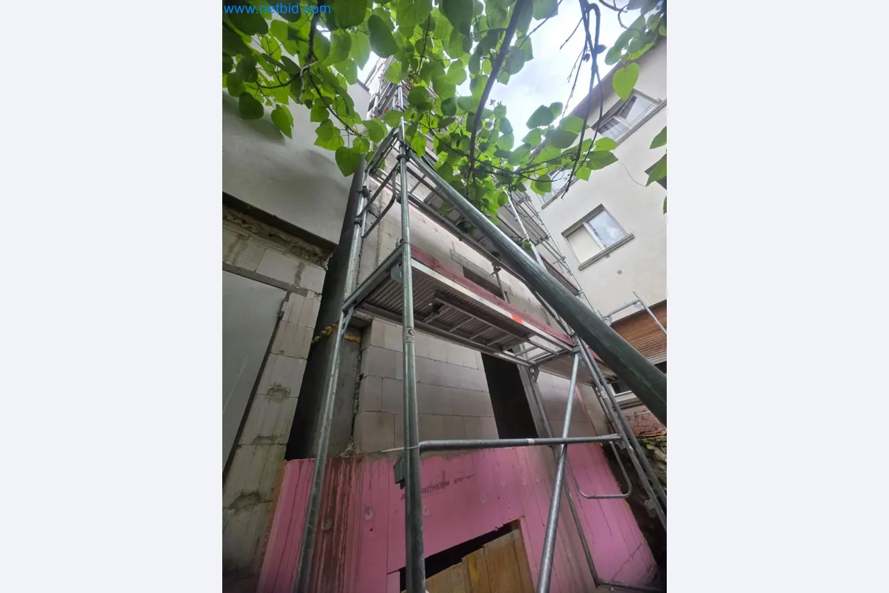 Scaffolding components (some from the construction site), machinery, and vehicles belonging to a construction company-2