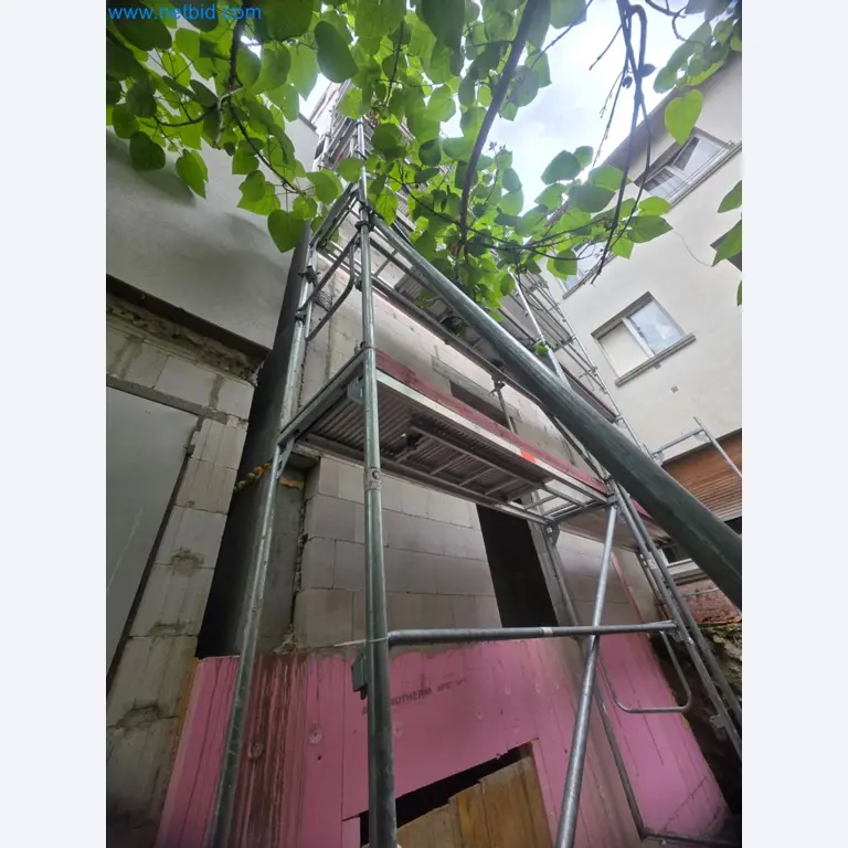 Scaffolding components (some from the construction site), machinery, and vehicles belonging to a construction company-2