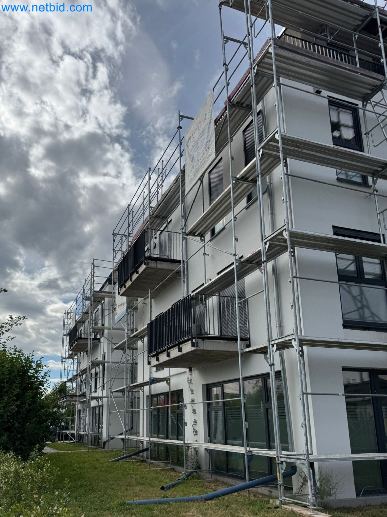Scaffolding components (some from the construction site), machinery, and vehicles belonging to a construction company-3