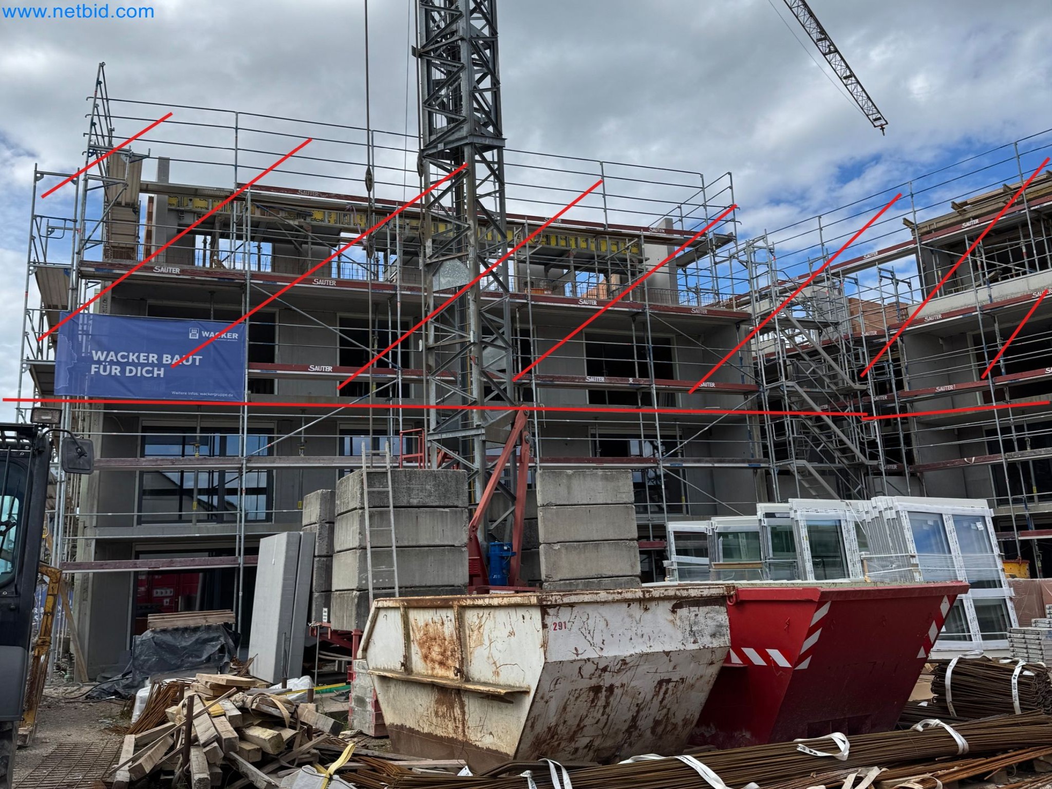 Scaffolding components (some from the construction site), machinery, and vehicles belonging to a construction company-6