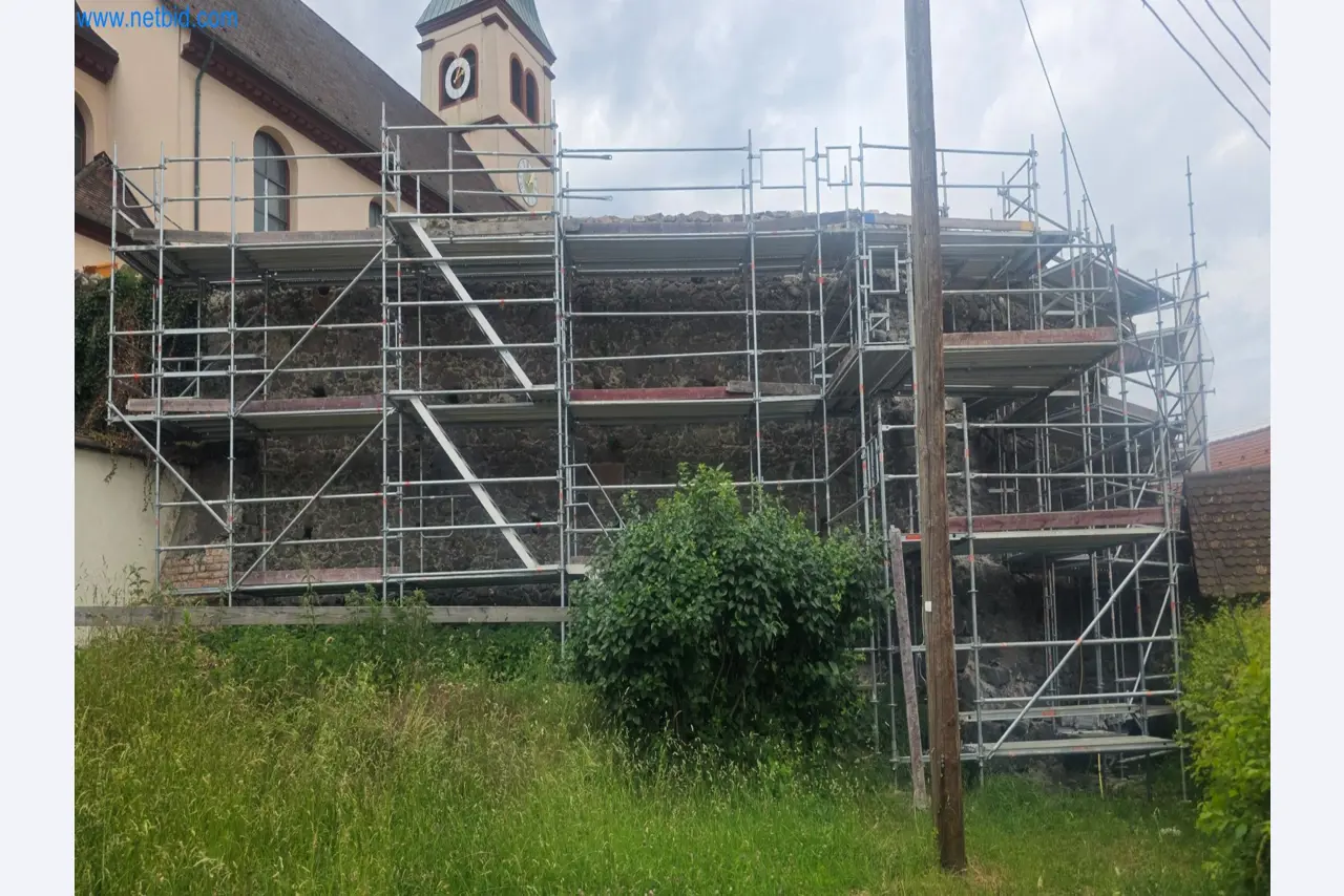 Scaffolding components (some from the construction site), machinery, and vehicles belonging to a construction company-1