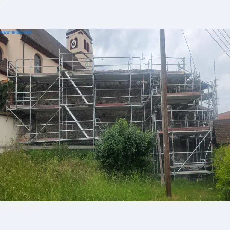 Scaffolding components (some from the construction site), machinery, and vehicles belonging to a construction company-1