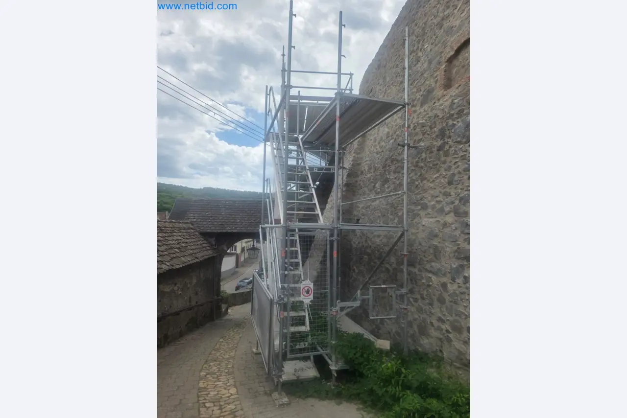 Scaffolding components (some from the construction site), machinery, and vehicles belonging to a construction company-2