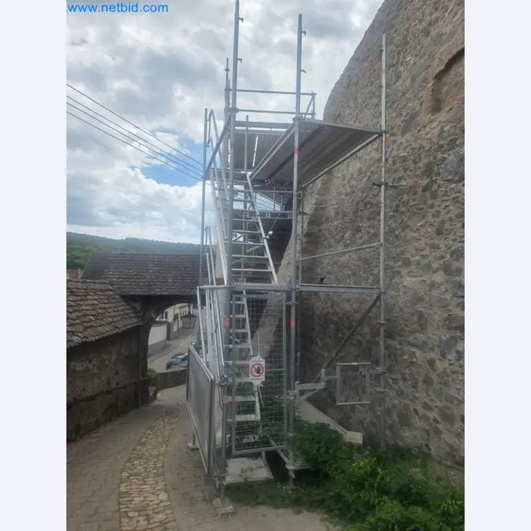 Scaffolding components (some from the construction site), machinery, and vehicles belonging to a construction company-2