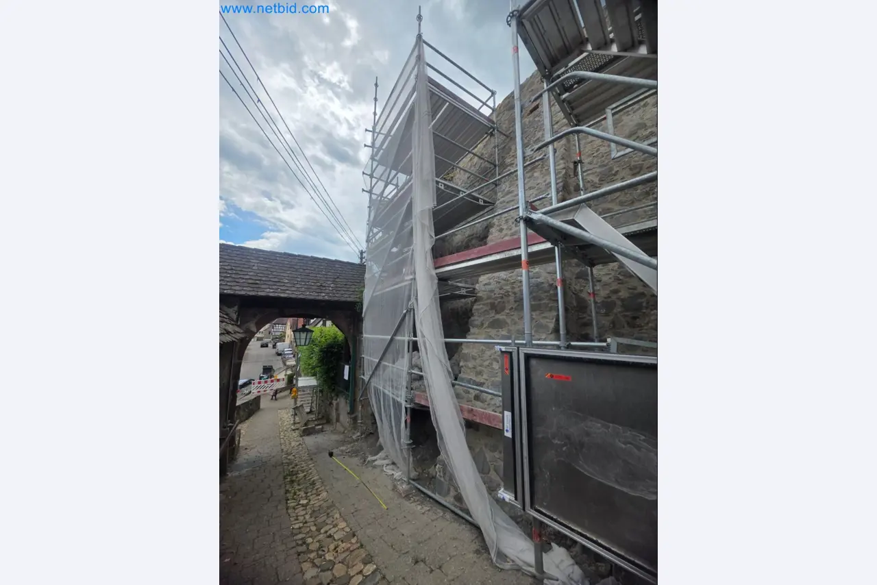 Scaffolding components (some from the construction site), machinery, and vehicles belonging to a construction company-5