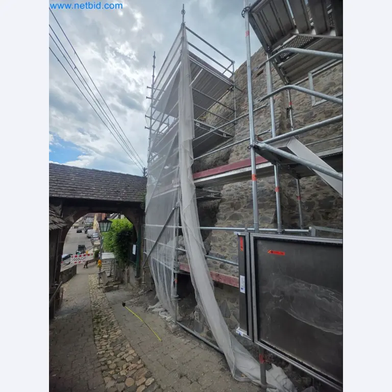 Scaffolding components (some from the construction site), machinery, and vehicles belonging to a construction company-5