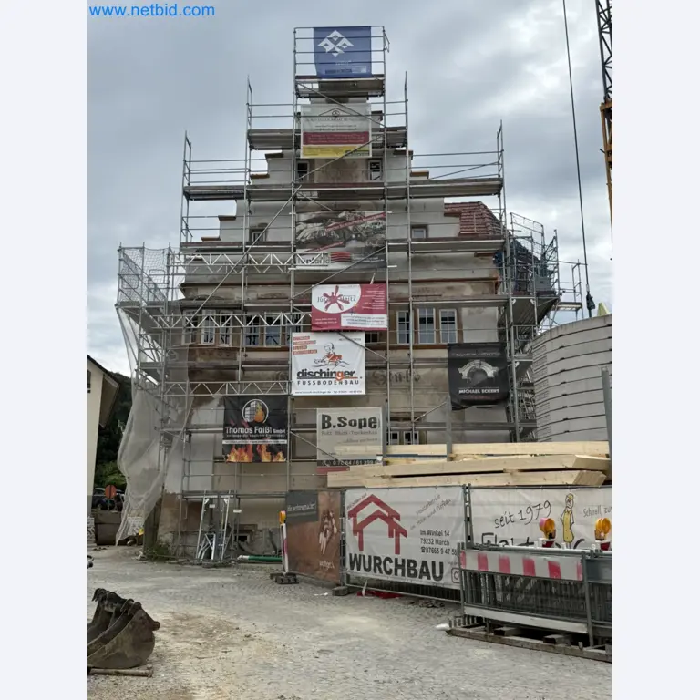 Scaffolding components (some from the construction site), machinery, and vehicles belonging to a construction company-1