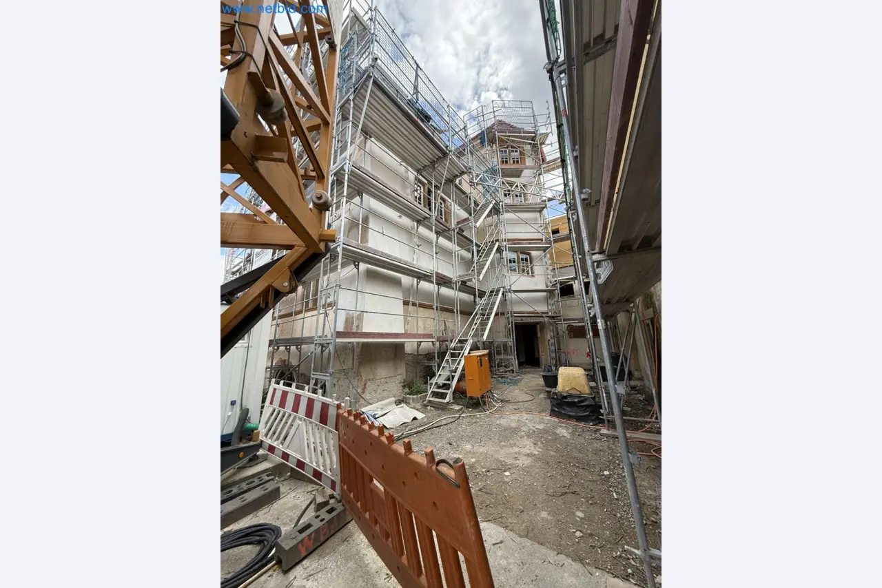 Scaffolding components (some from the construction site), machinery, and vehicles belonging to a construction company-3