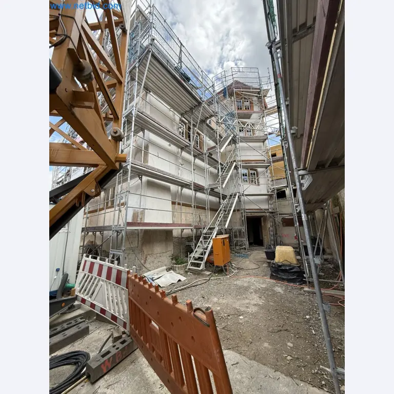 Scaffolding components (some from the construction site), machinery, and vehicles belonging to a construction company-3