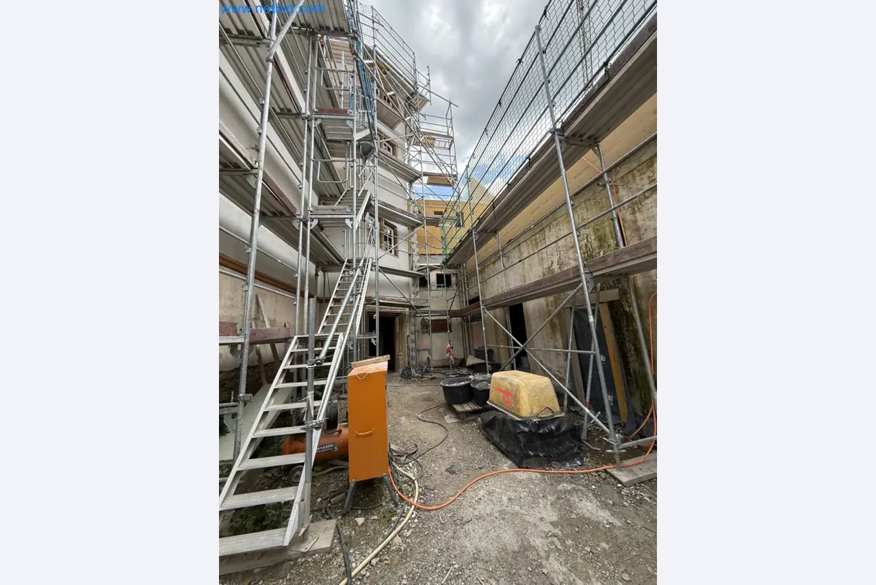 Scaffolding components (some from the construction site), machinery, and vehicles belonging to a construction company-4