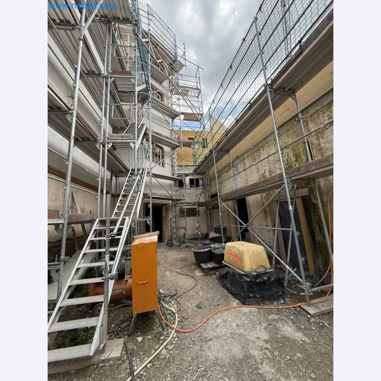 Scaffolding components (some from the construction site), machinery, and vehicles belonging to a construction company-4