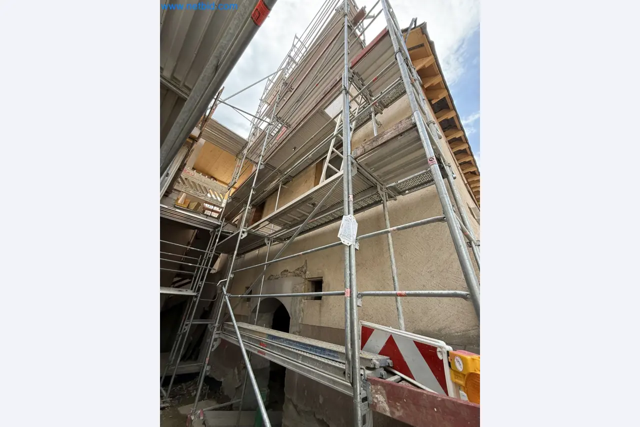 Scaffolding components (some from the construction site), machinery, and vehicles belonging to a construction company-5