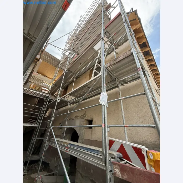 Scaffolding components (some from the construction site), machinery, and vehicles belonging to a construction company-5