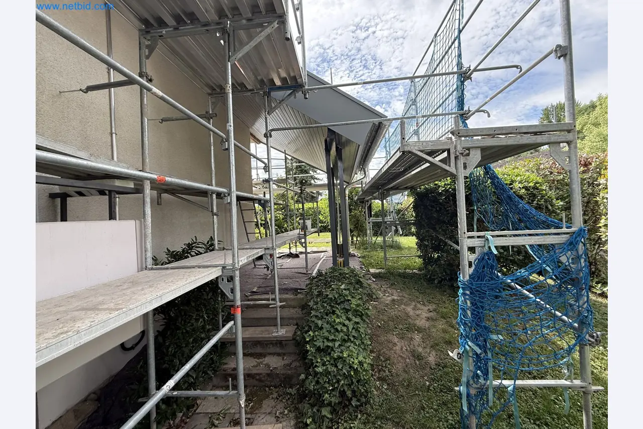 Scaffolding components (some from the construction site), machinery, and vehicles belonging to a construction company-5