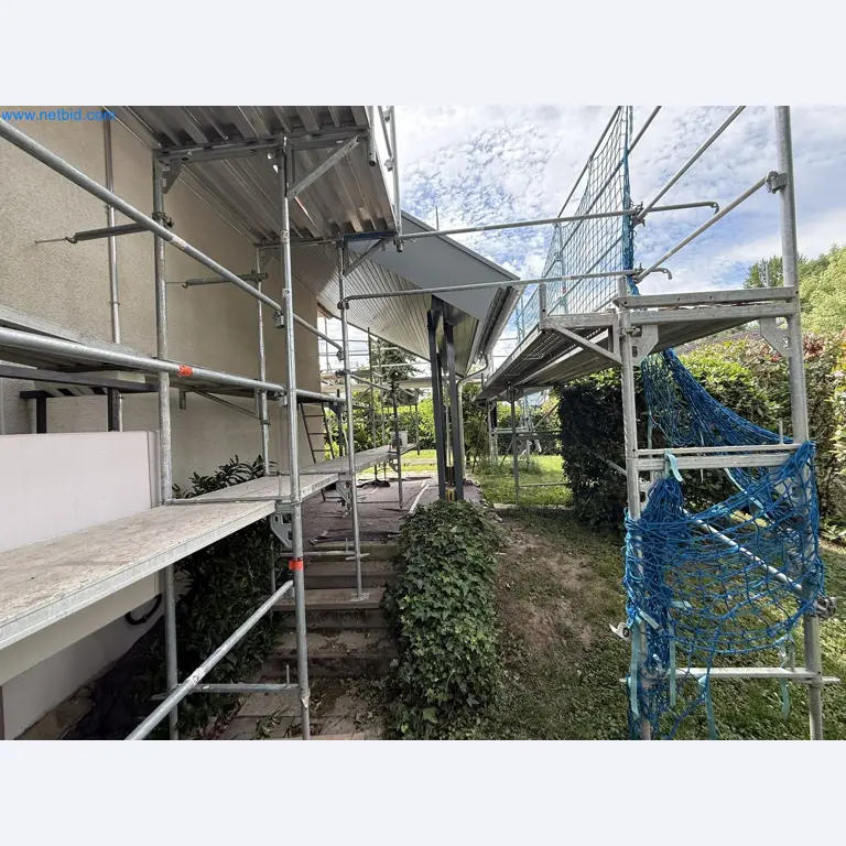 Scaffolding components (some from the construction site), machinery, and vehicles belonging to a construction company-5