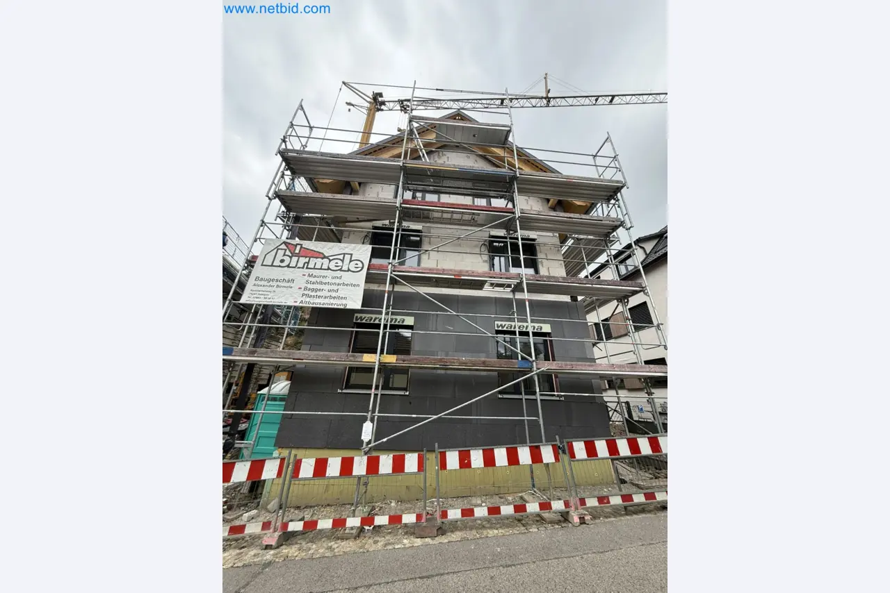 Scaffolding components (some from the construction site), machinery, and vehicles belonging to a construction company-1