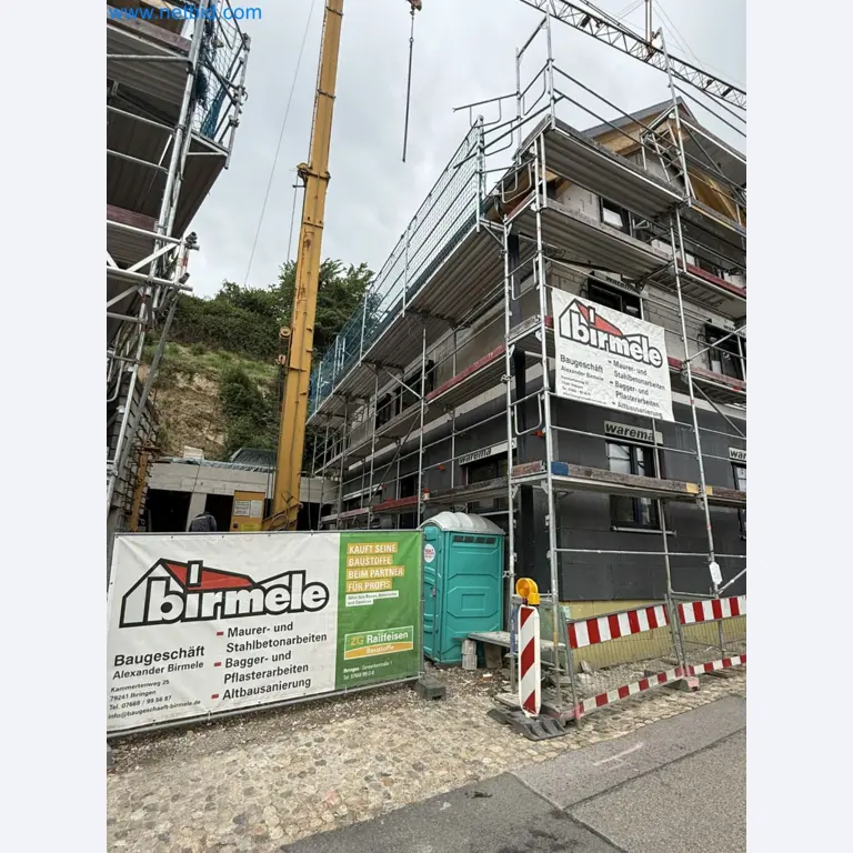 Scaffolding components (some from the construction site), machinery, and vehicles belonging to a construction company-3
