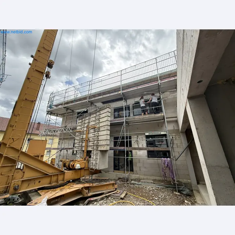Scaffolding components (some from the construction site), machinery, and vehicles belonging to a construction company-4