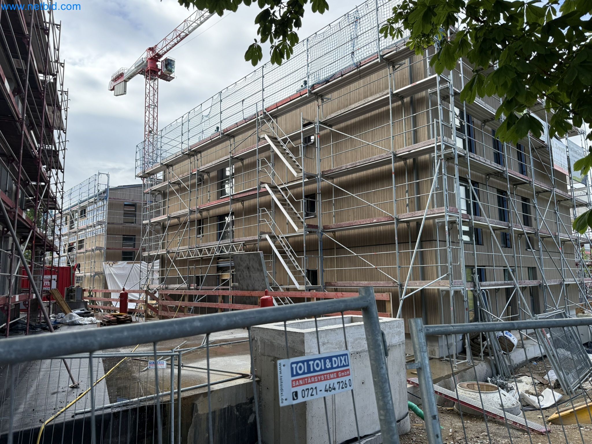 Scaffolding components (some from the construction site), machinery, and vehicles belonging to a construction company-2