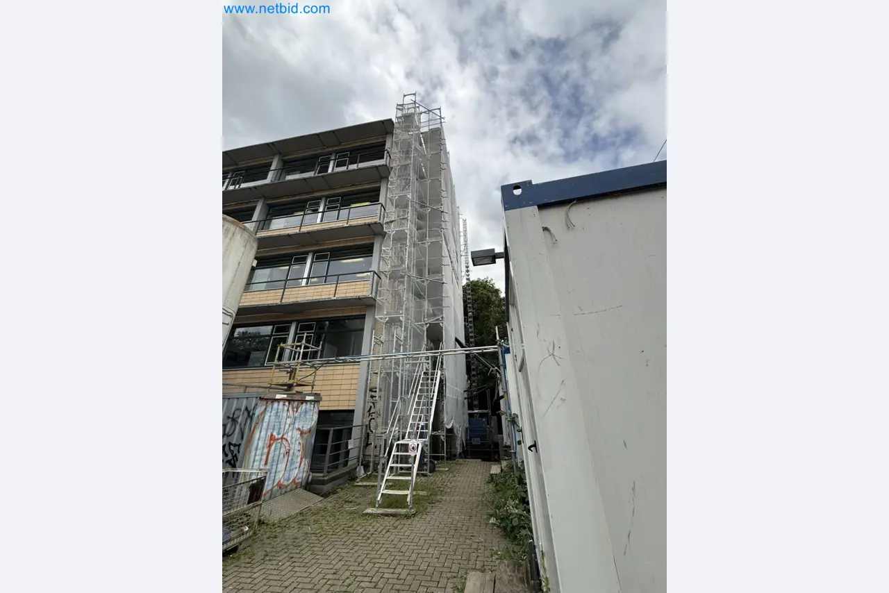 Scaffolding components (some from the construction site), machinery, and vehicles belonging to a construction company-7