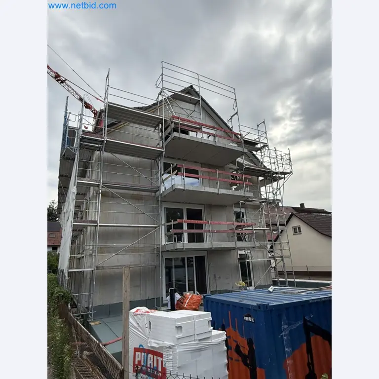 Scaffolding components (some from the construction site), machinery, and vehicles belonging to a construction company-2