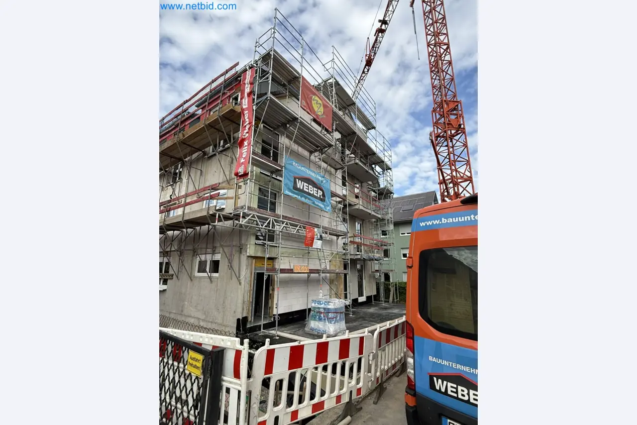 Scaffolding components (some from the construction site), machinery, and vehicles belonging to a construction company-3
