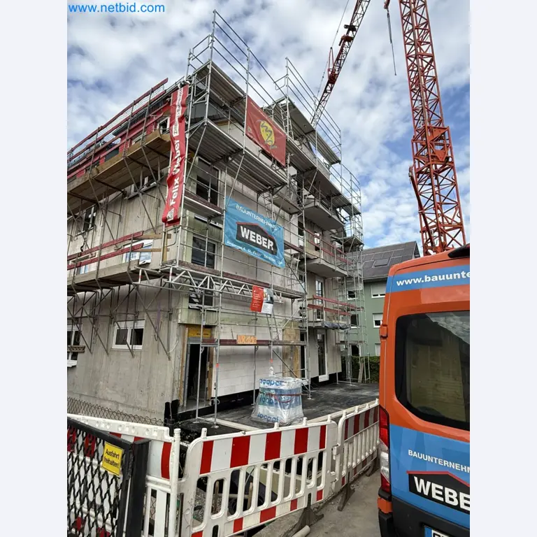 Scaffolding components (some from the construction site), machinery, and vehicles belonging to a construction company-3
