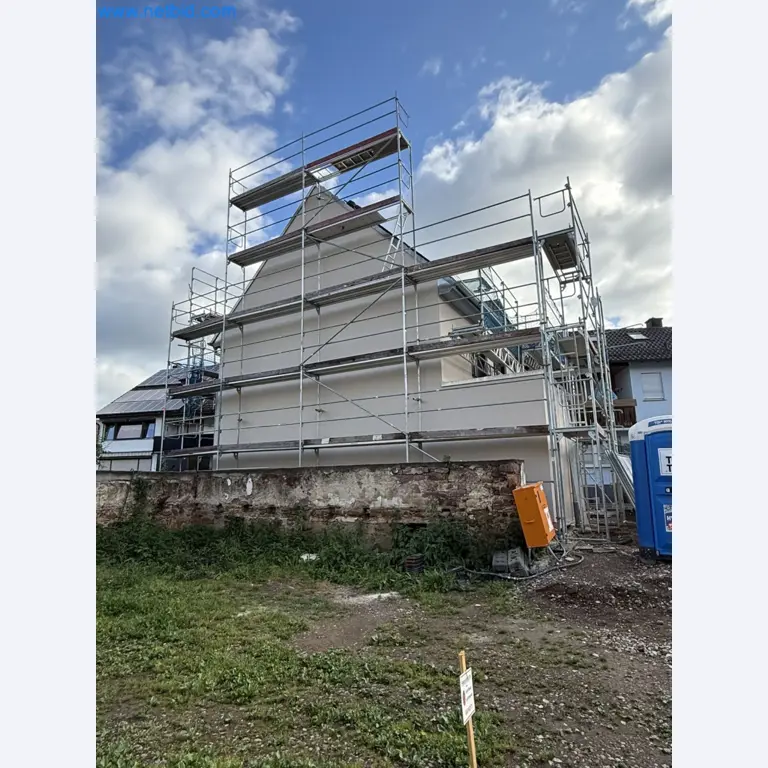 Scaffolding components (some from the construction site), machinery, and vehicles belonging to a construction company-2