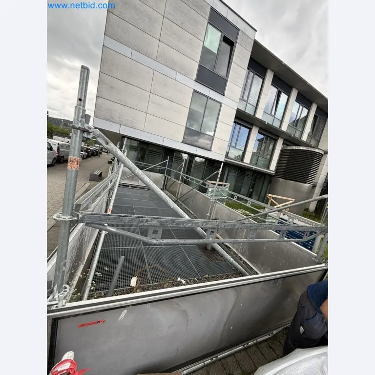 Scaffolding components (some from the construction site), machinery, and vehicles belonging to a construction company-2