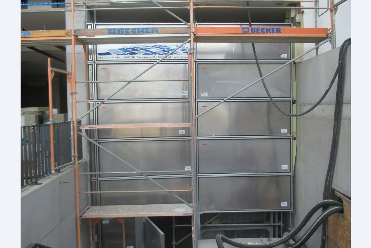 Scaffolding components (some from the construction site), machinery, and vehicles belonging to a construction company-1