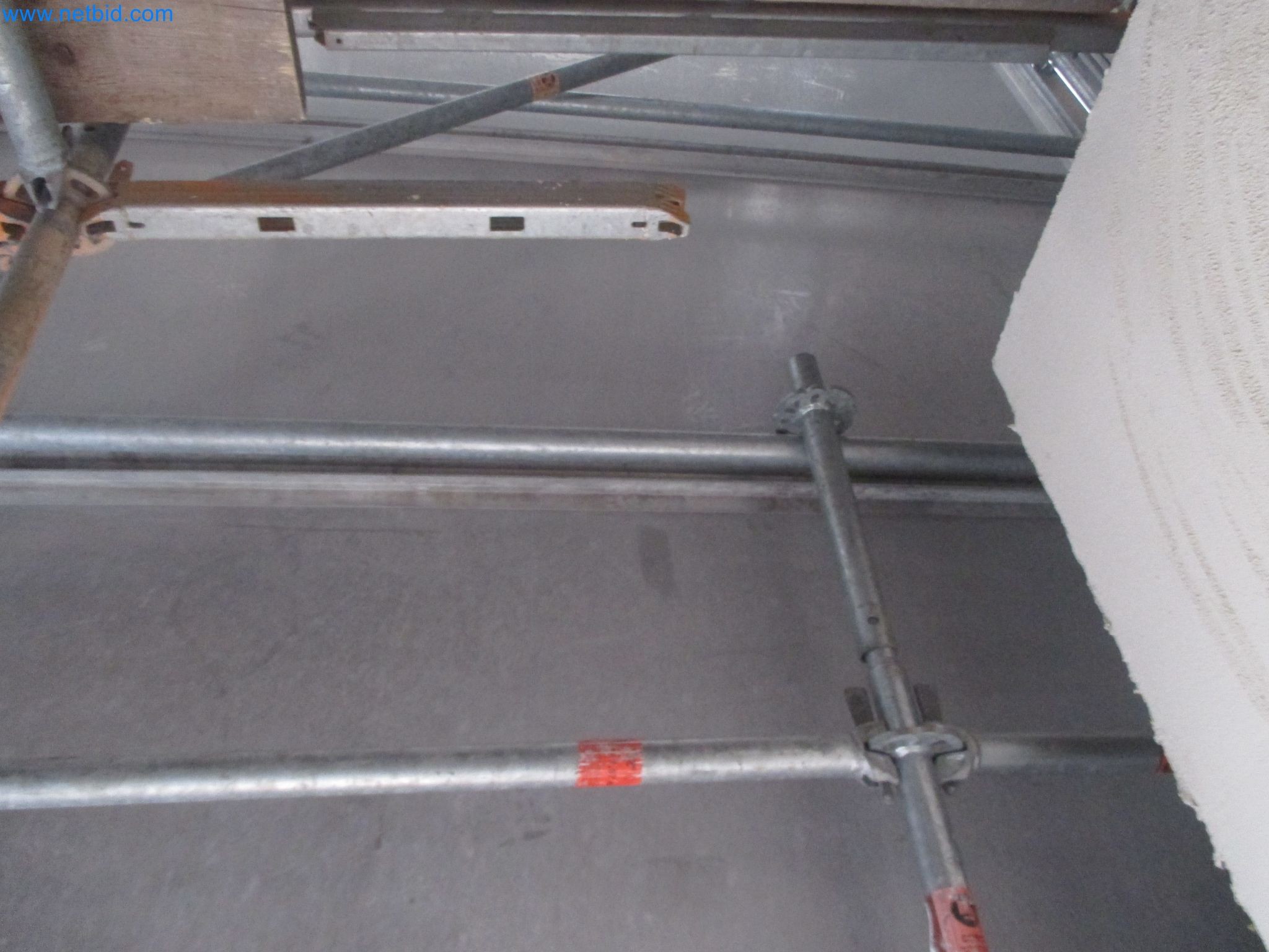 Scaffolding components (some from the construction site), machinery, and vehicles belonging to a construction company-4