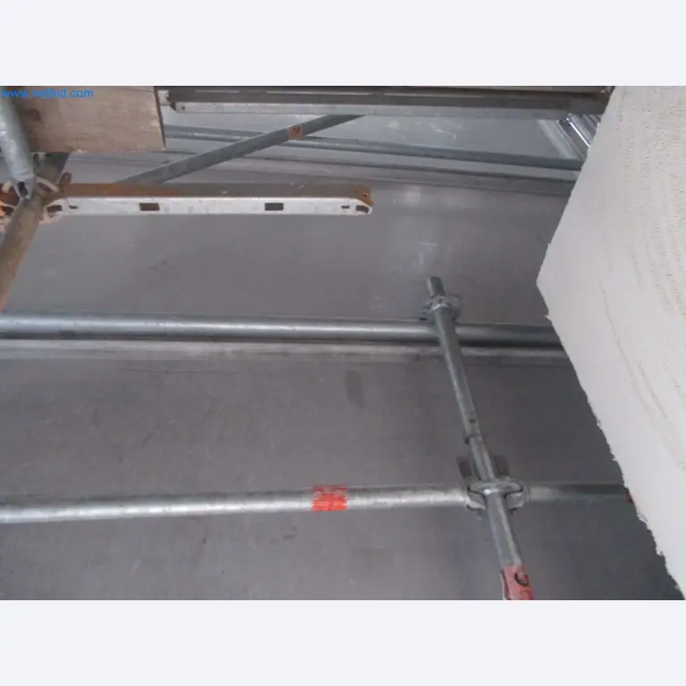 Scaffolding components (some from the construction site), machinery, and vehicles belonging to a construction company-4