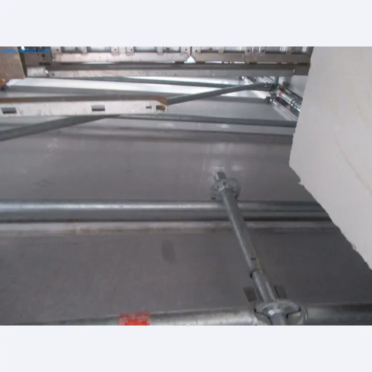 Scaffolding components (some from the construction site), machinery, and vehicles belonging to a construction company-5