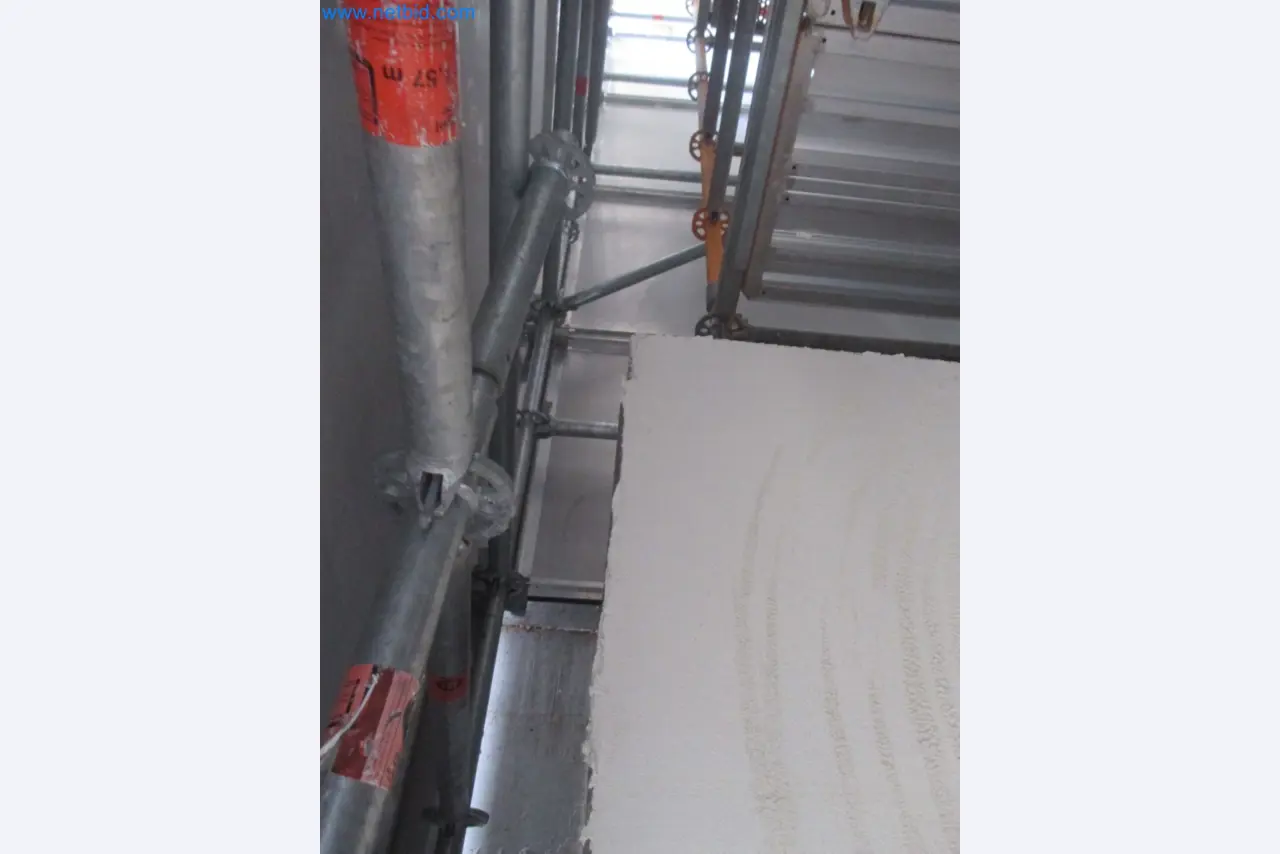 Scaffolding components (some from the construction site), machinery, and vehicles belonging to a construction company-6