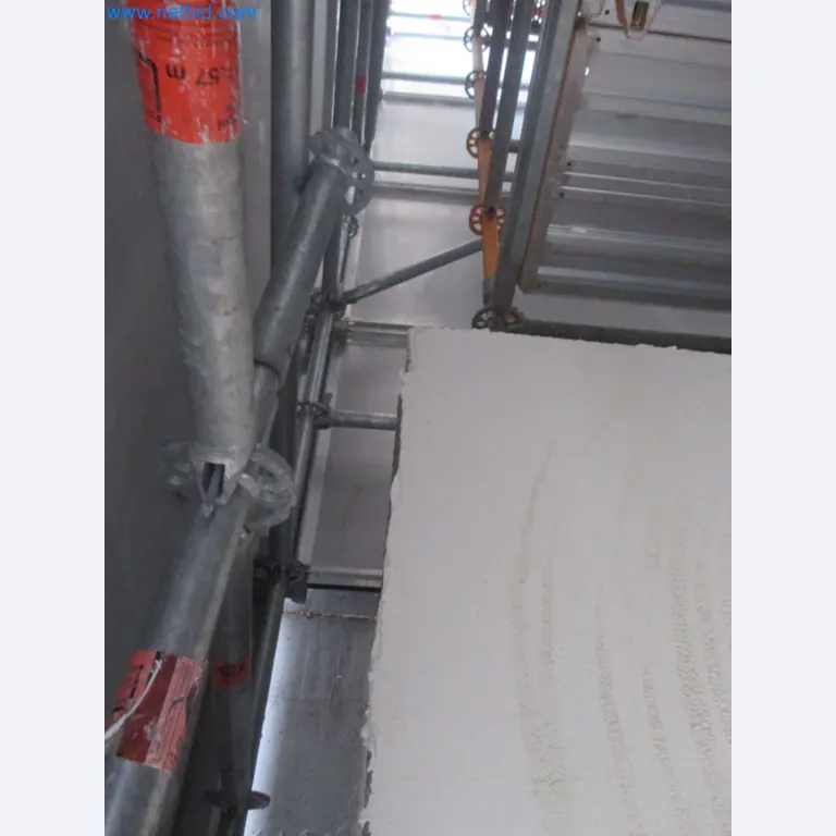 Scaffolding components (some from the construction site), machinery, and vehicles belonging to a construction company-6