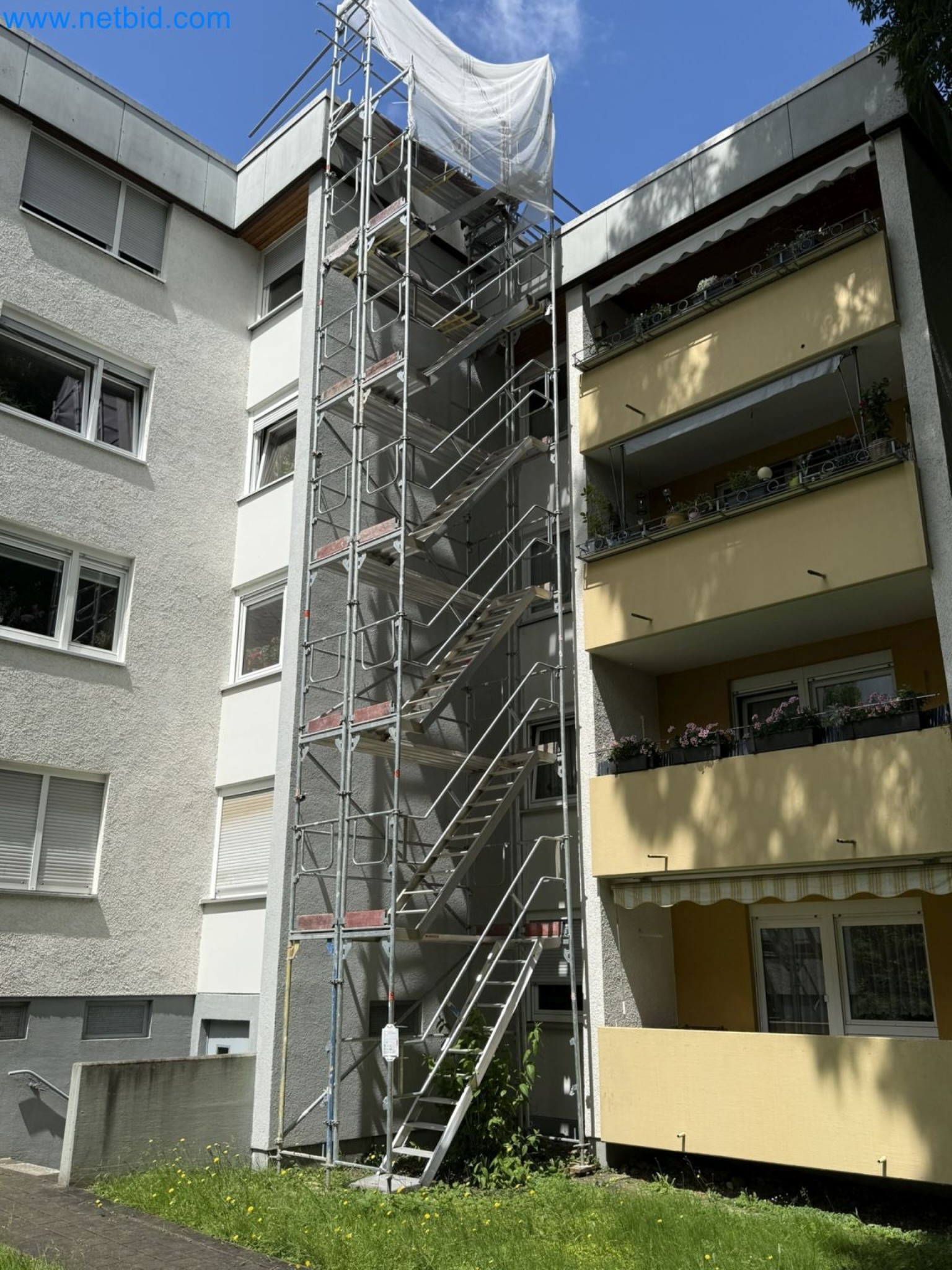 Scaffolding components (some from the construction site), machinery, and vehicles belonging to a construction company-1