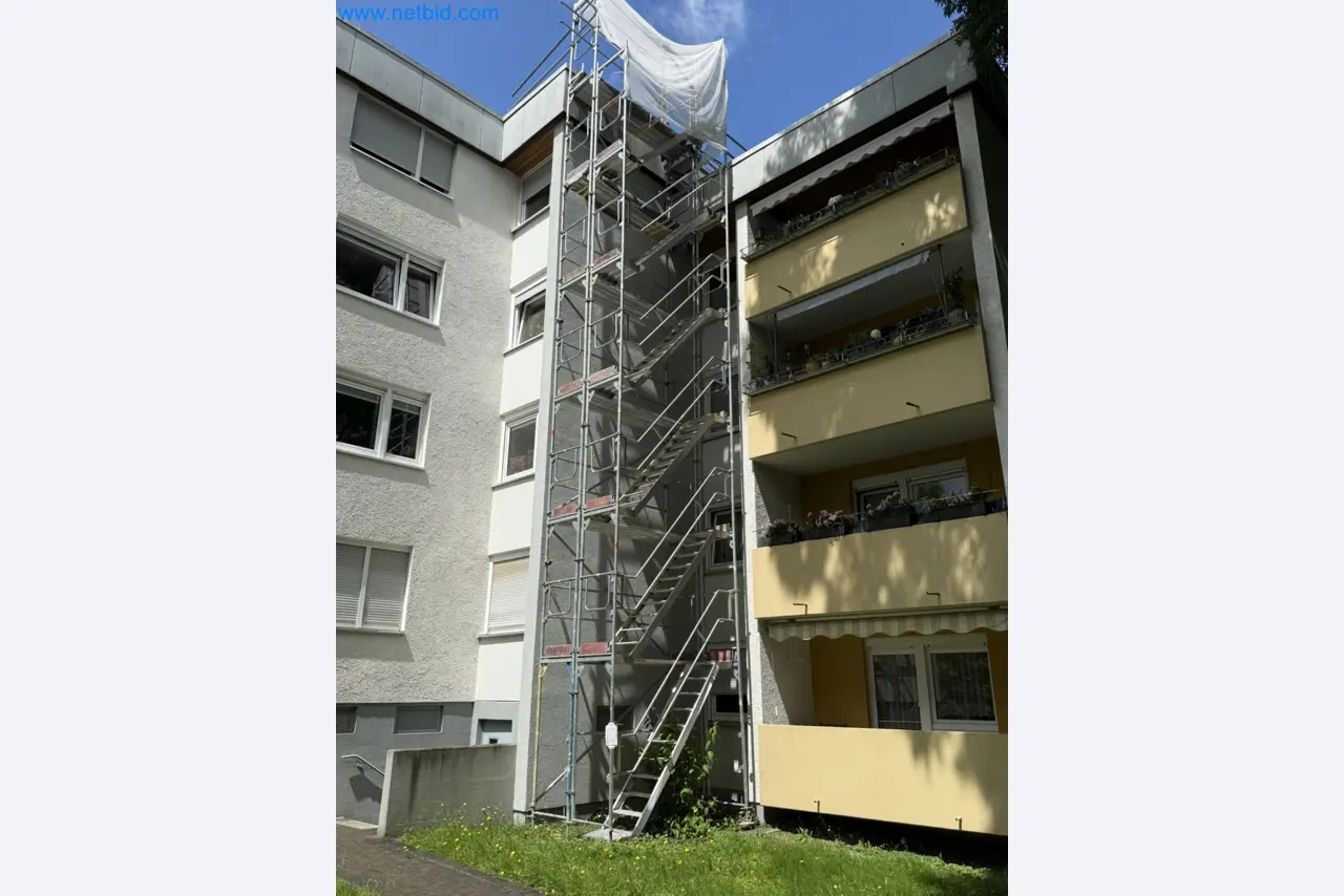 Scaffolding components (some from the construction site), machinery, and vehicles belonging to a construction company-1