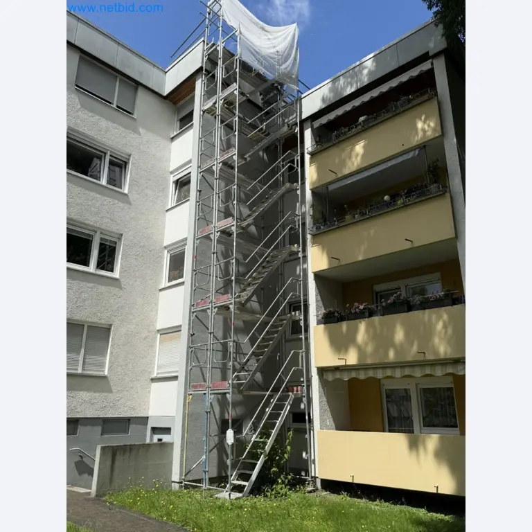 Scaffolding components (some from the construction site), machinery, and vehicles belonging to a construction company-1