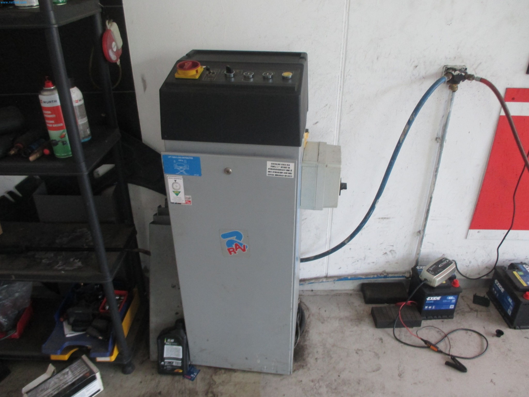 Passenger cars, electric cars, and automotive repair shop equipment at a Fiat dealership-2