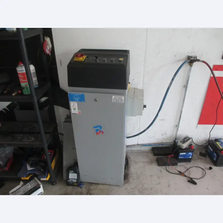 Passenger cars, electric cars, and automotive repair shop equipment at a Fiat dealership-2
