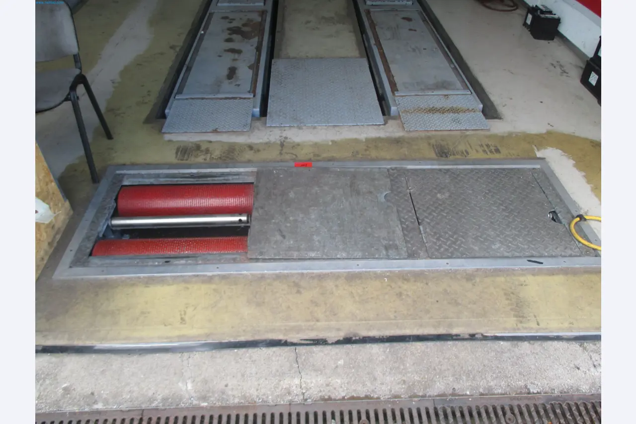 Passenger cars, electric cars, and automotive repair shop equipment at a Fiat dealership-1