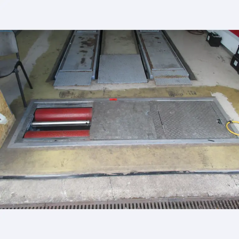 Passenger cars, electric cars, and automotive repair shop equipment at a Fiat dealership-1