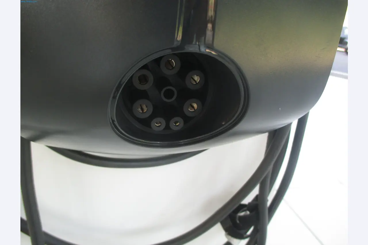 Passenger cars, electric cars, and automotive repair shop equipment at a Fiat dealership-2