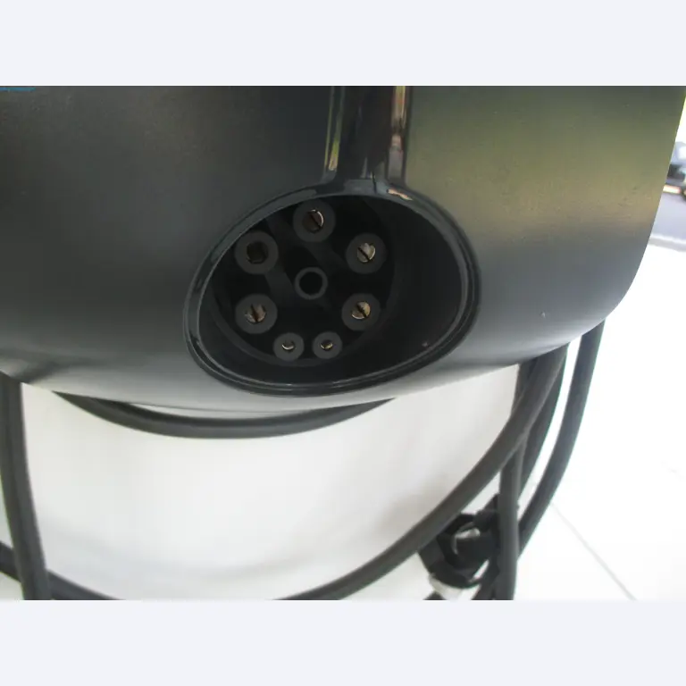 Passenger cars, electric cars, and automotive repair shop equipment at a Fiat dealership-2