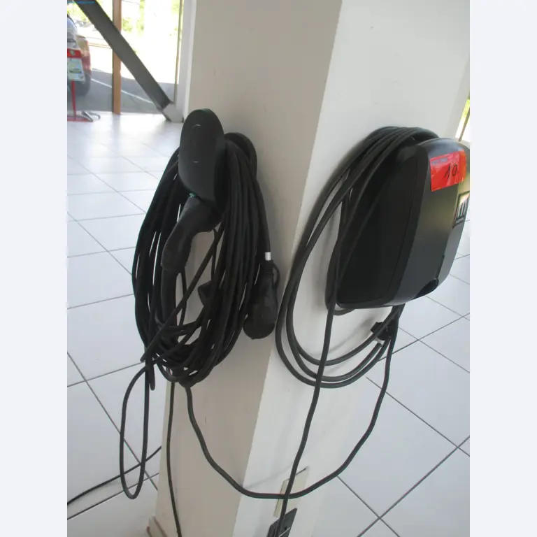 Passenger cars, electric cars, and automotive repair shop equipment at a Fiat dealership-3